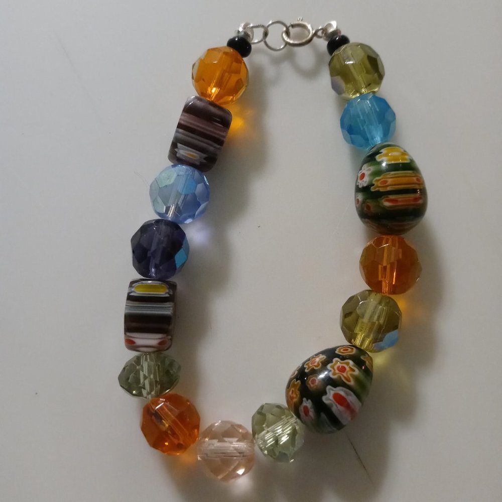 Beaded orange and flower bracelet